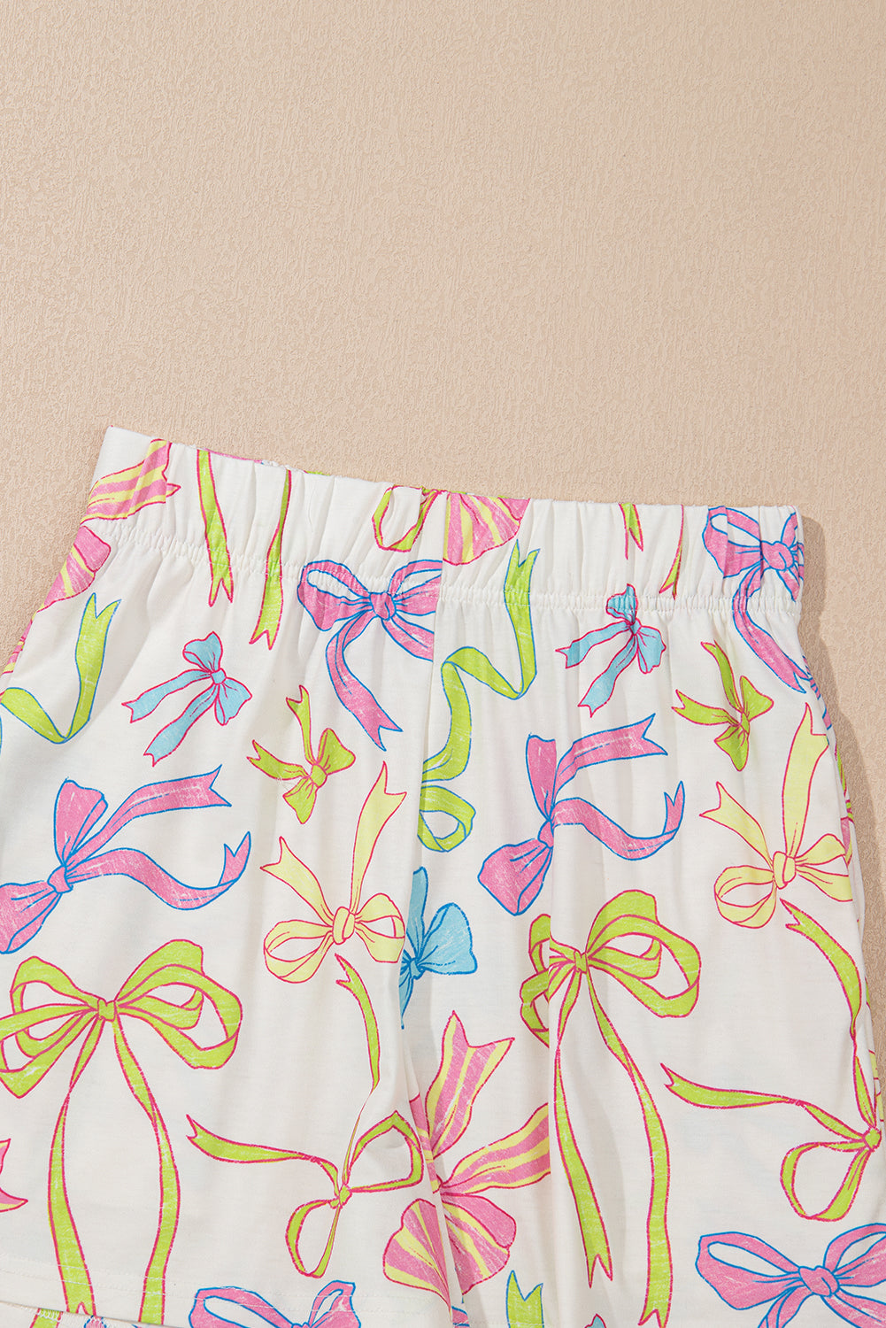 Colorful drawstring casual shorts for mens with vibrant ribbon patterns from LuckeLAdybug LLC