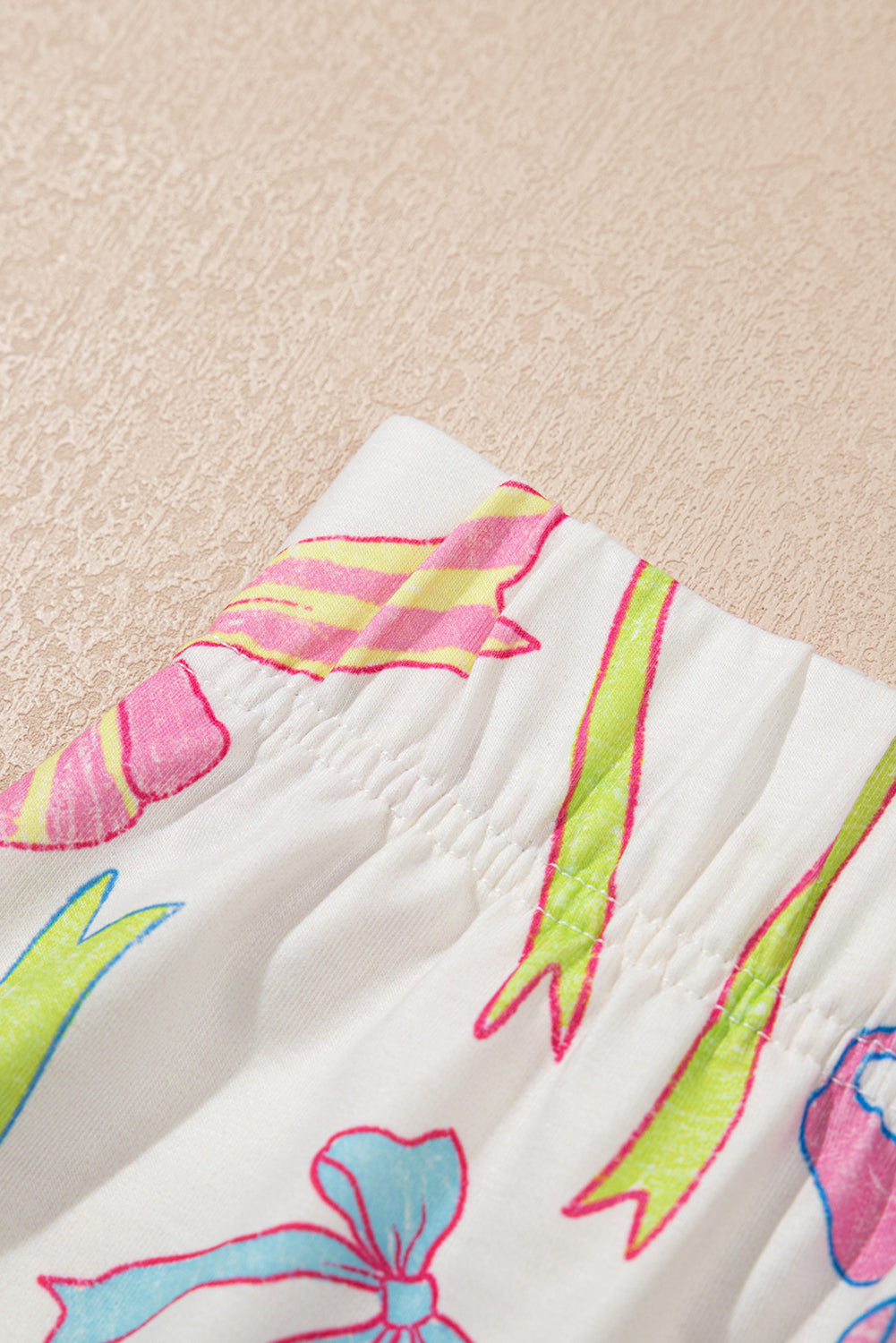 LuckeLAdybug LLC Casual shorts for mens featuring a colorful ribbon print design