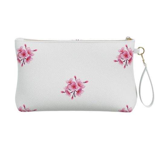 LuckeLadybug vegan leather cherry blossom cosmetic bag with pink floral design and wrist strap