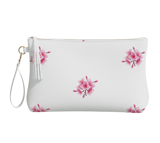 LuckeLadybug vegan leather cherry blossom cosmetic bag with pink floral design and zipper closure