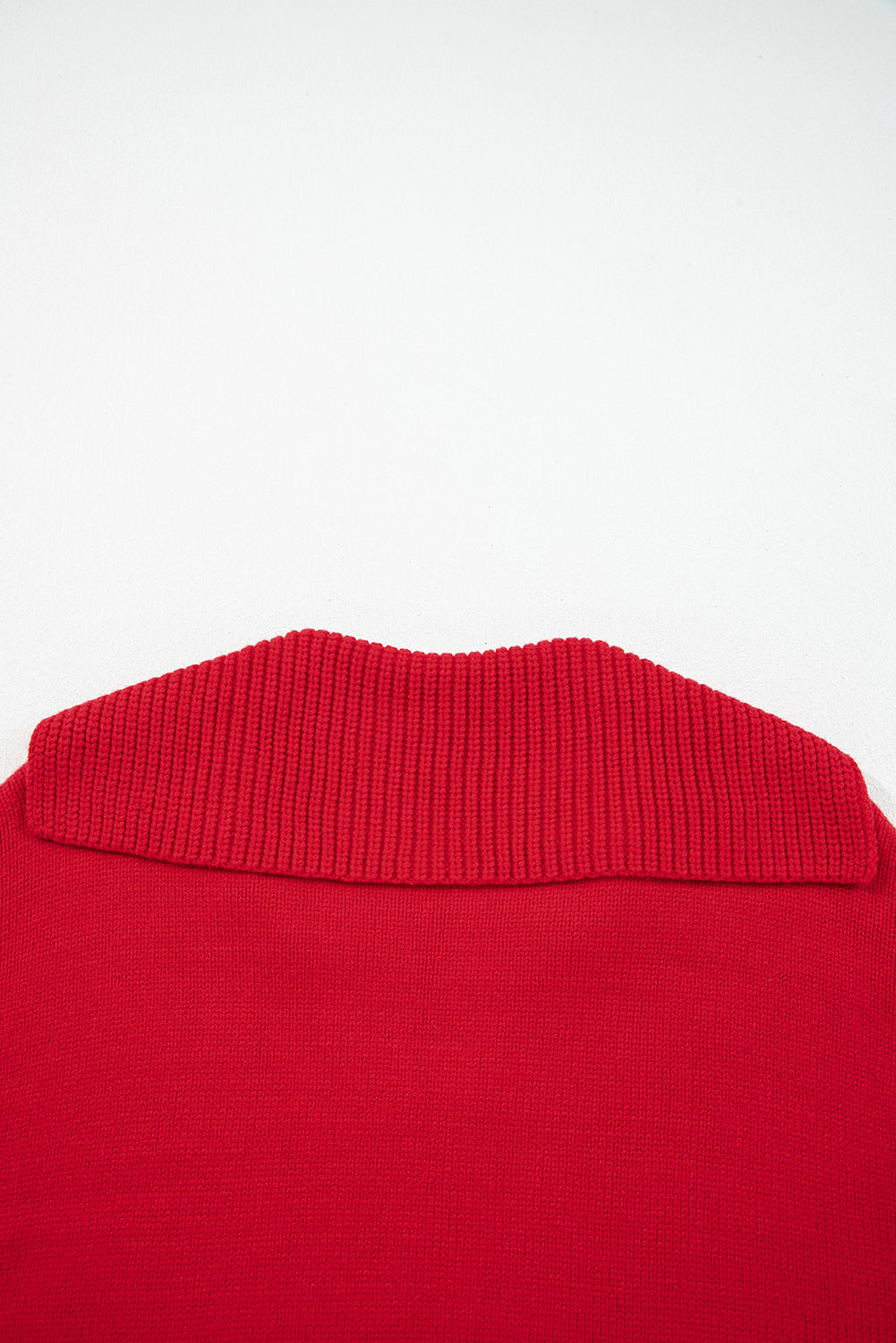 Back view of a vibrant red sweater with a ribbed collar, featuring a chestnut v neck sweater for women design.