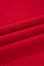 Close-up of fabric texture showing the soft weave of a chestnut v neck sweater for women