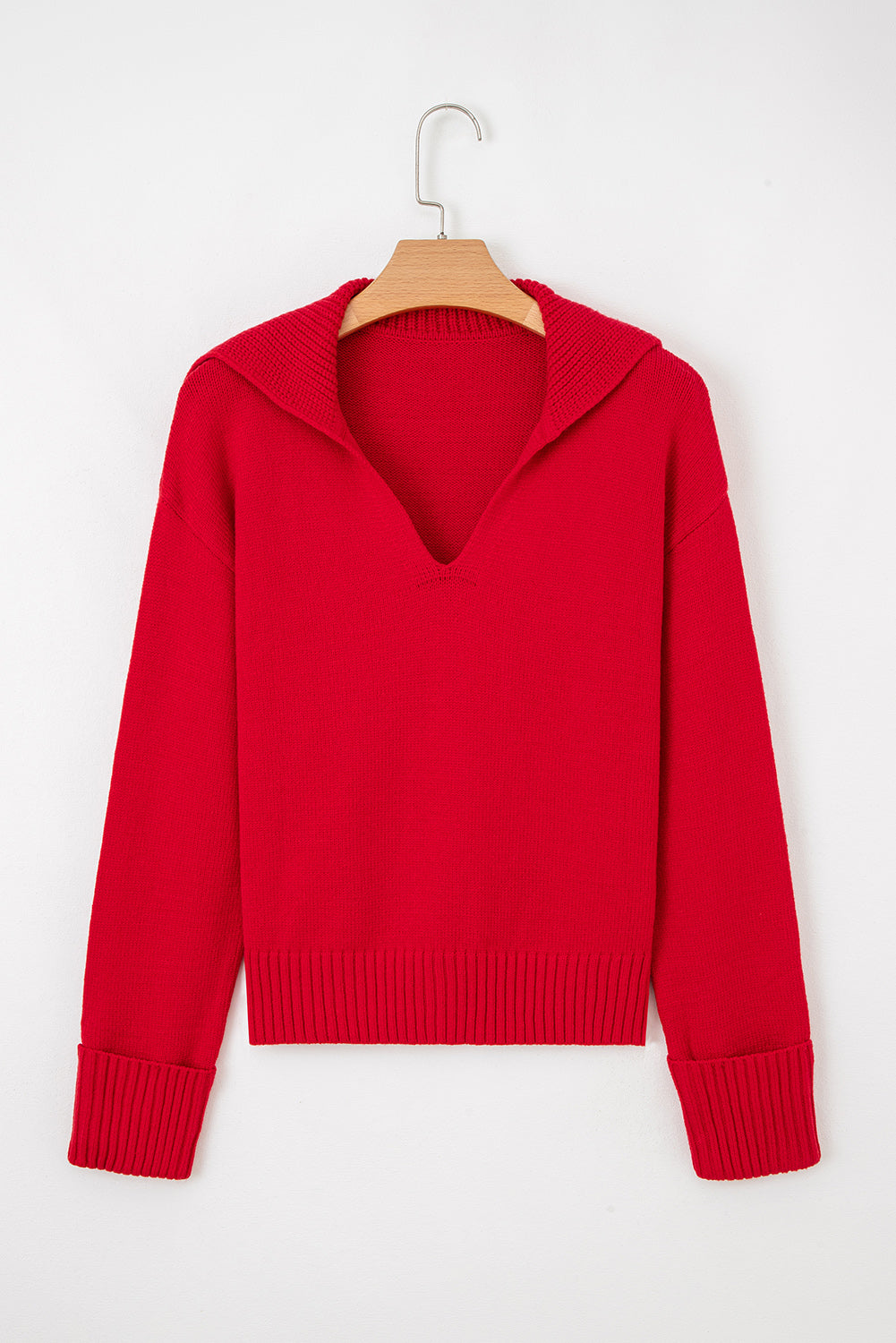 Red cropped sweater with a V-neck design, perfect for pairing with casual outfits, featuring a stylish chestnut v neck sweater for women.
