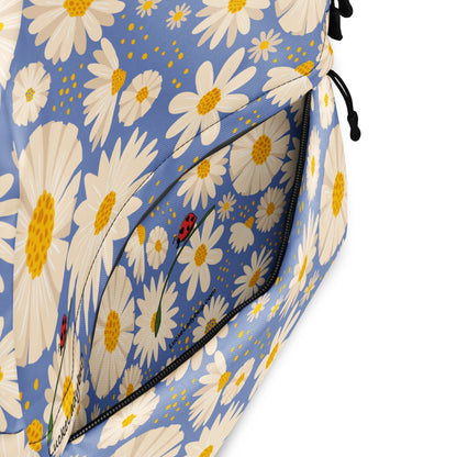 LuckeLadybug trendy flower backpack with white daisy pattern and front zipper pocket on blue background