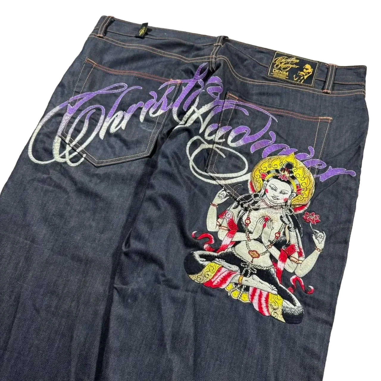 Unique Y2K baggy jeans for women with colorful embroidered design and stylish lettering