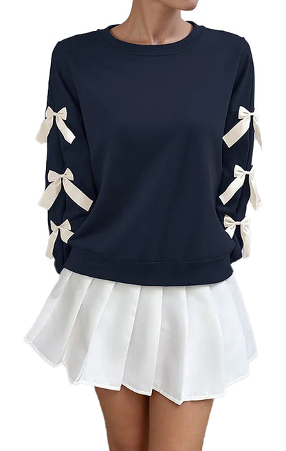 Navy Christmas bow women’s sweatshirt with stylish bow details on sleeves for festive fashion