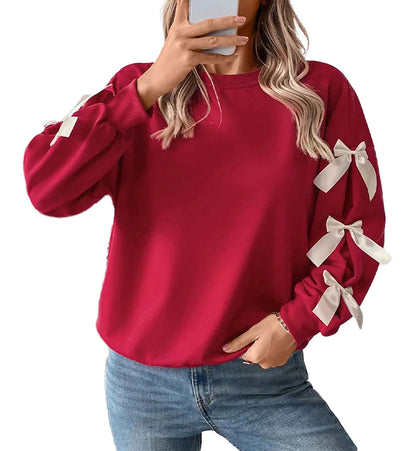 Women's Christmas bow women's sweatshirt in red with white bow details on sleeves