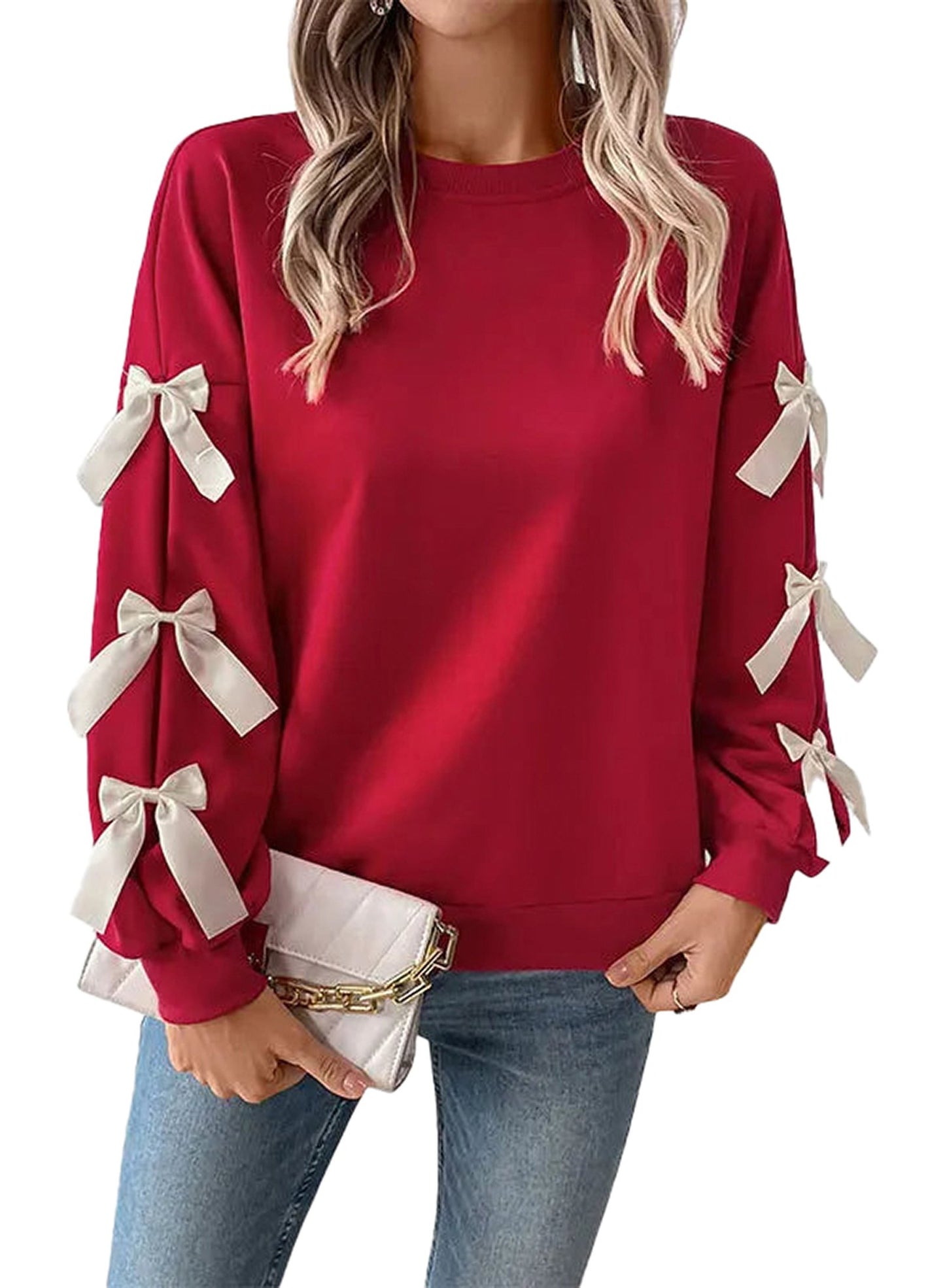 Red Christmas bow women’s sweatshirt with cream bows on sleeves for festive style
