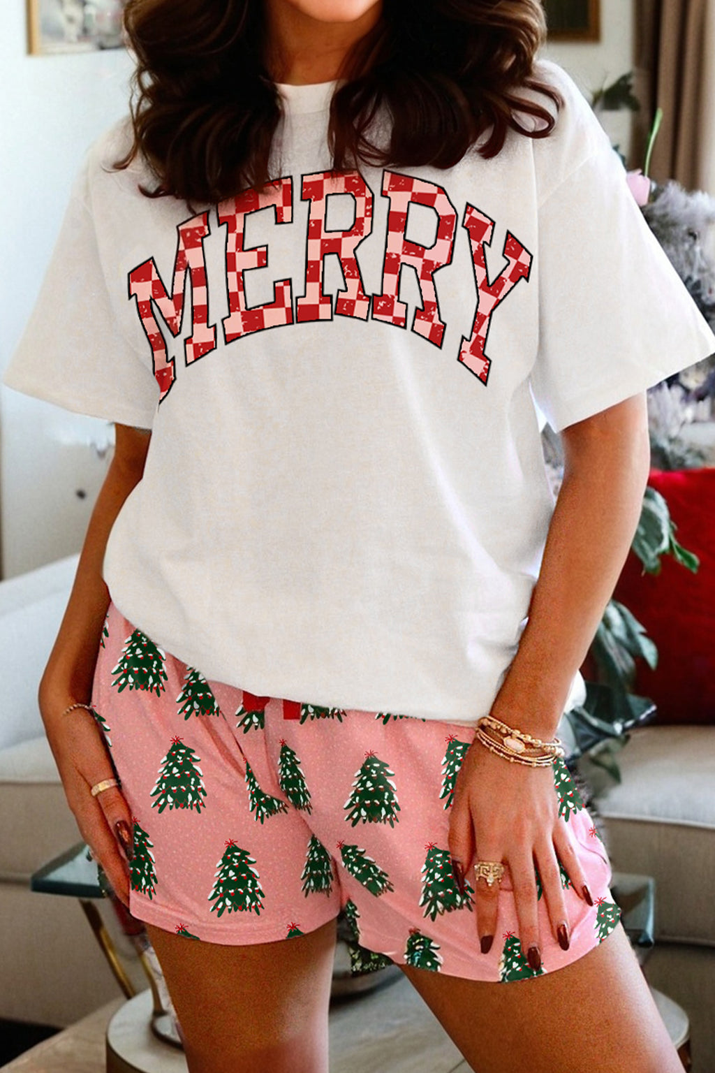 LuckeLadybug Christmas pajamas set with Merry graphic tee and pink shorts featuring green Christmas trees