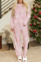 Pink Christmas pajamas by LuckeLadybug LLC with festive tree and snowflake prints for cozy holiday wear