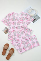 LuckeLadybug LLC Christmas pajamas in pink with holiday-themed prints and a comfortable design
