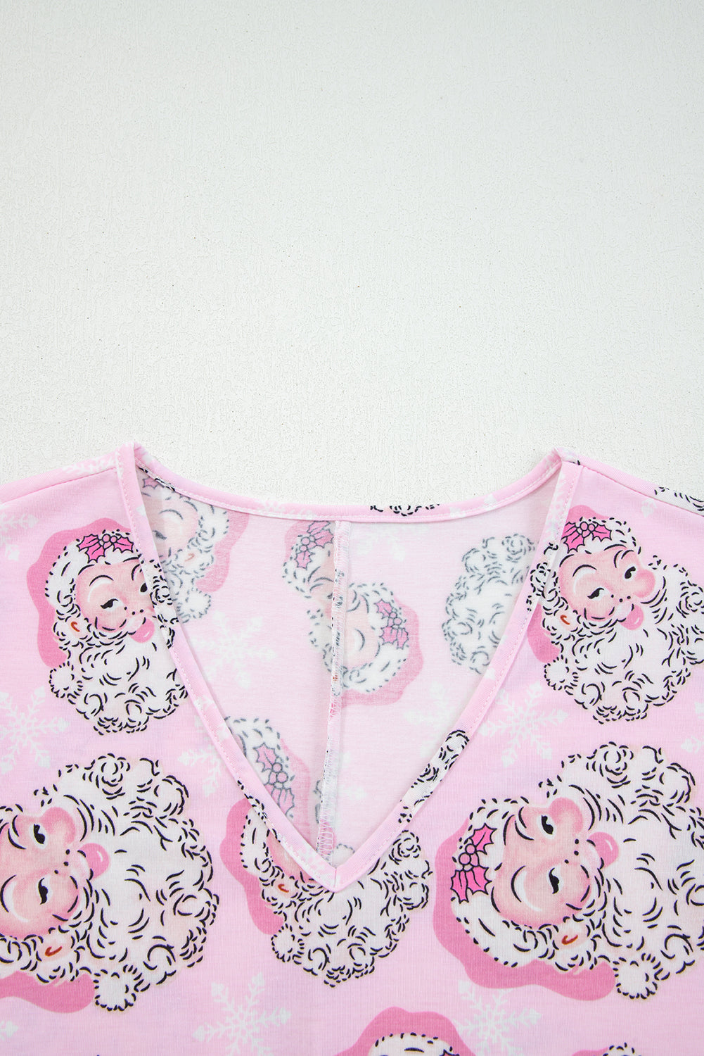LuckeLadybug LLC Pink Christmas Pajamas with Cheerful Santa Print and V-Neck Design