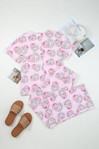 LuckeLadybug LLC Christmas pajamas featuring playful pink and white design, perfect for festive lounging