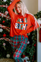LuckeLadybug Christmas pajamas set featuring a red top and plaid pants for festive comfort