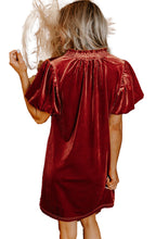 Back view of a cinnamon velvet mini dress with puff sleeves, perfect for stylish casual wear