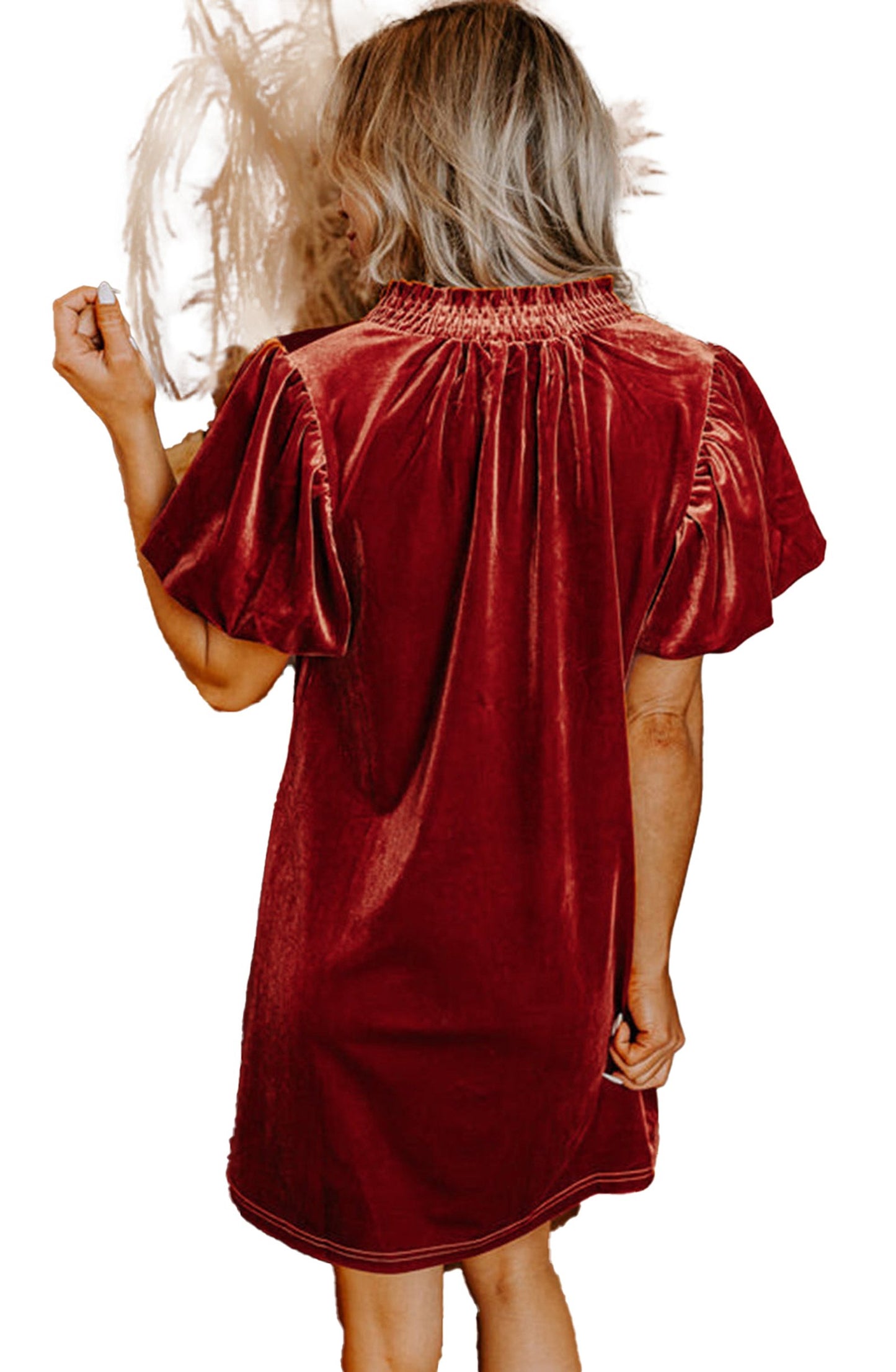 Back view of a cinnamon velvet mini dress with puff sleeves, perfect for stylish casual wear