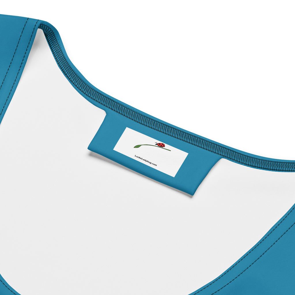 Close-up of LuckeLadybug blue elegant bodycon dress for women showing neckline and label