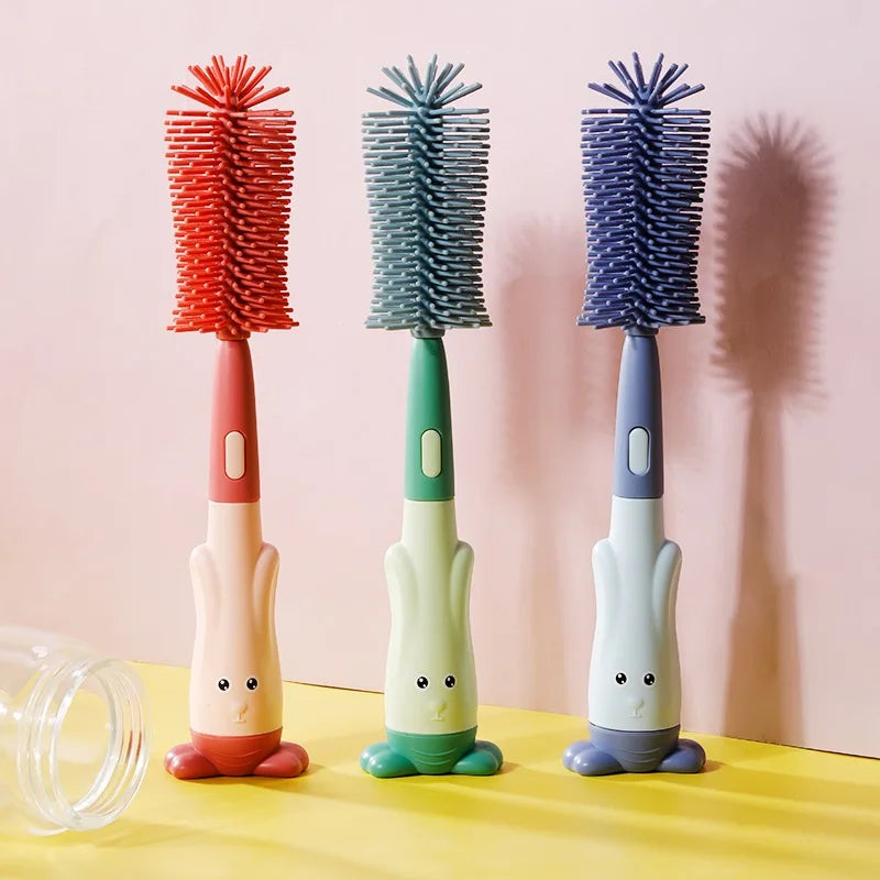 Set of three colorful clothes dryer vent cleaning brushes with cute bunny designs