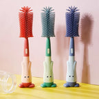Set of three colorful clothes dryer vent cleaning brushes with cute bunny designs