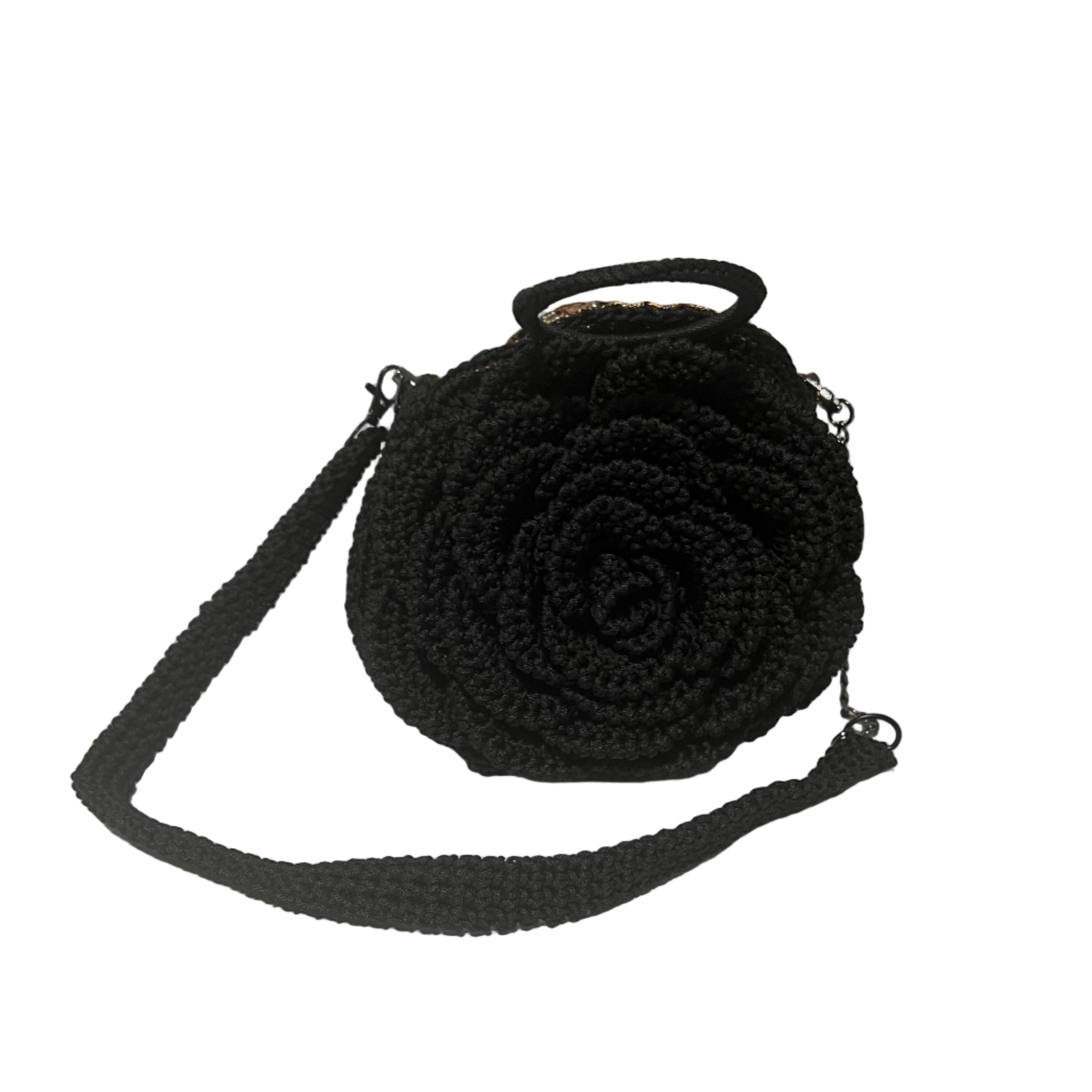 Black crochet crossbody bag with floral design, perfect for casual outings and stylish accessories, coach floral bag