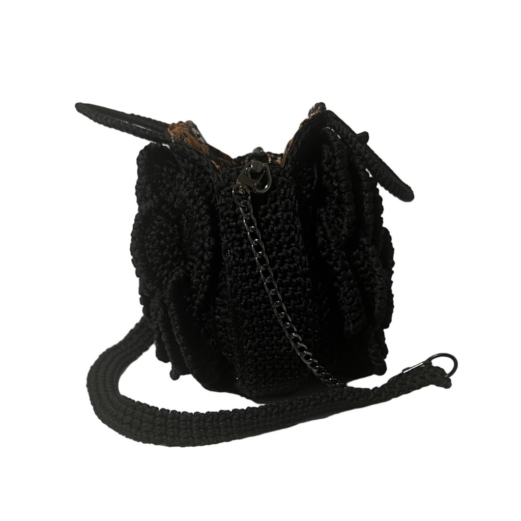 Stylish black crossbody bag with floral details, perfect for casual outings and everyday use, coach floral bag