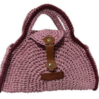 Handcrafted pink coach handbag pink made with braided material and leather accents for stylish outings