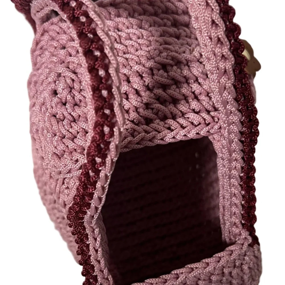 Handcrafted pink clutch from ThreadsByHannah resembling a coach handbag pink with woven details