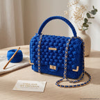 Handcrafted blue crochet clutch by ThreadsByHannah, a stylish coach handbag purse