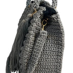 Stylish gray crochet coach purse shoulder bag with a trendy tassel detail for everyday use