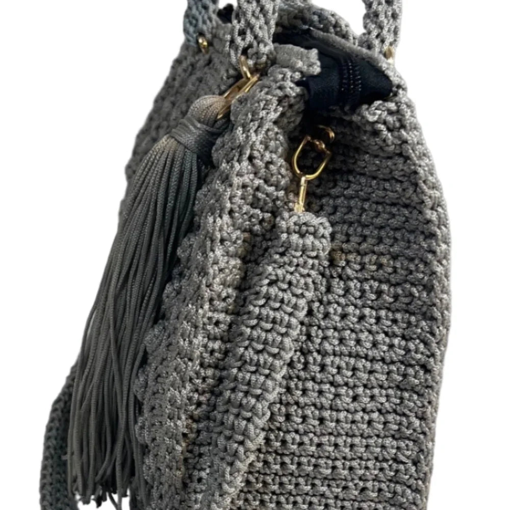 Stylish gray crochet coach purse shoulder bag with a trendy tassel detail for everyday use