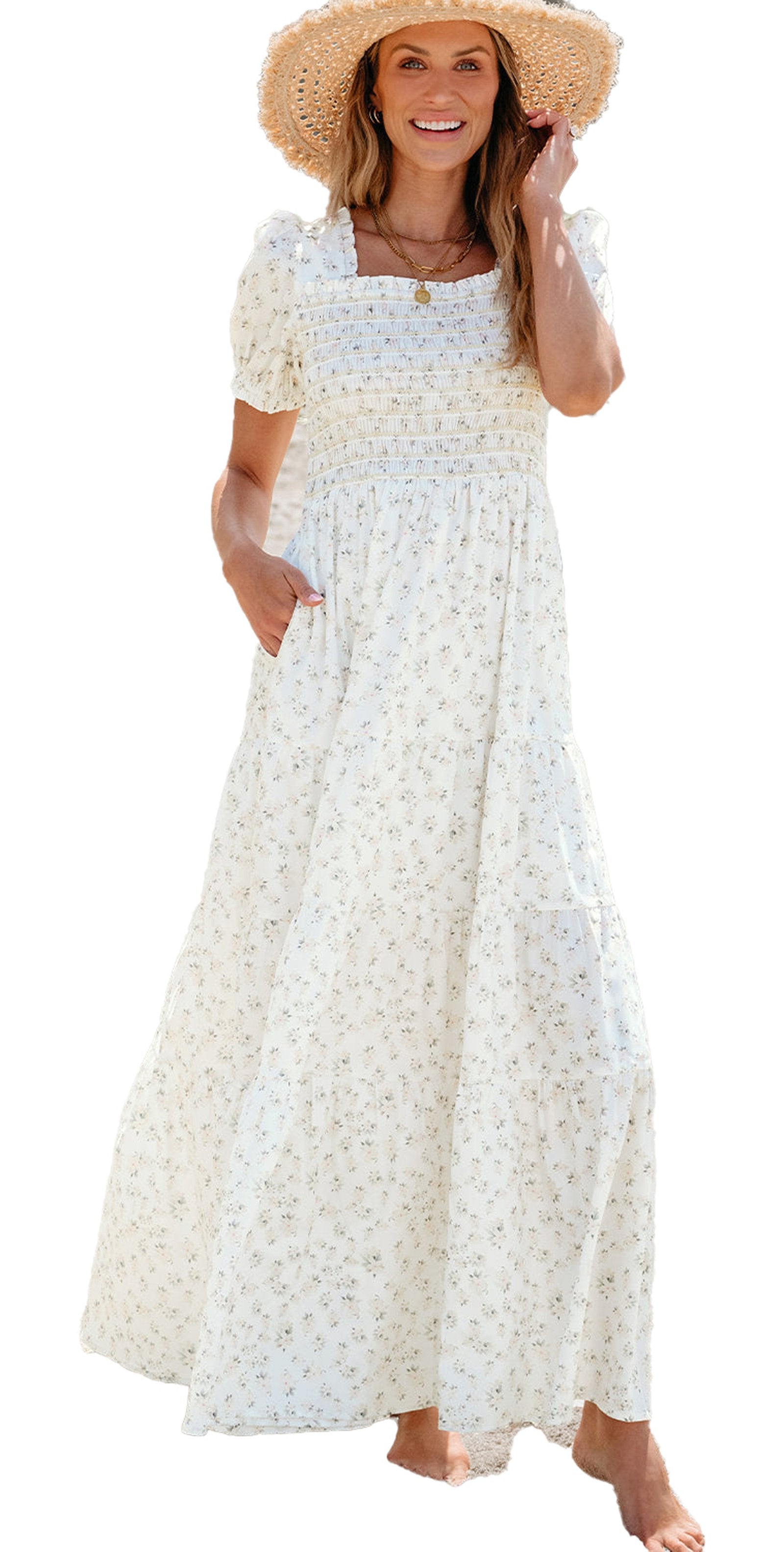 LuckeLadybug white floral maxi dress with smocked bodice puff sleeves side pockets worn by woman on beach