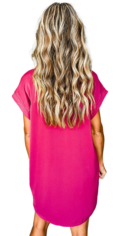 Back view of model wearing rose red button down mini dress with short sleeves relaxed fit and curved hem