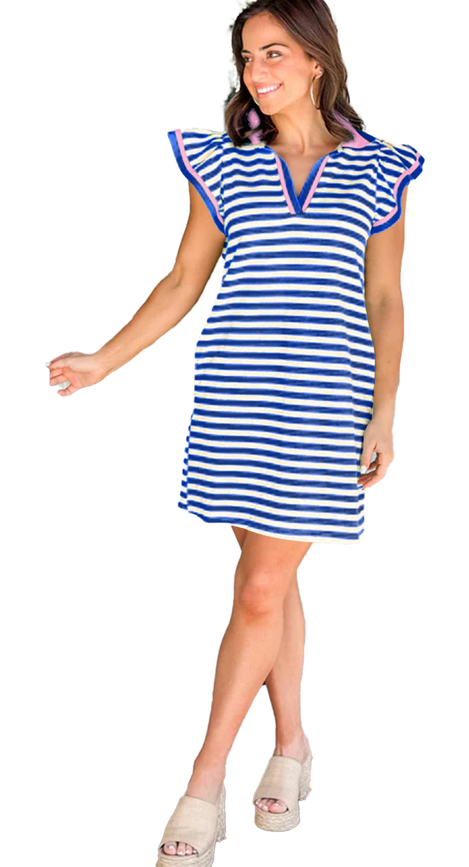 LuckeLadybug H Line dark blue striped flutter sleeve dress on smiling model by front door with v neck