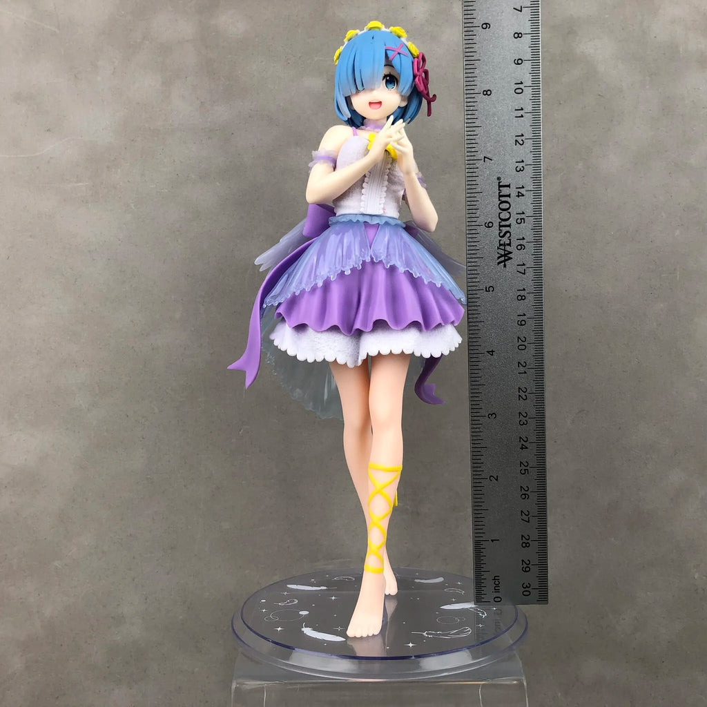 LuckeLadybug LLC collectible figure of Rem in purple dress with clear base and ruler for size reference