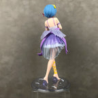 Back view of a detailed collectible figure in a colorful dress by LuckeLadybug LLC