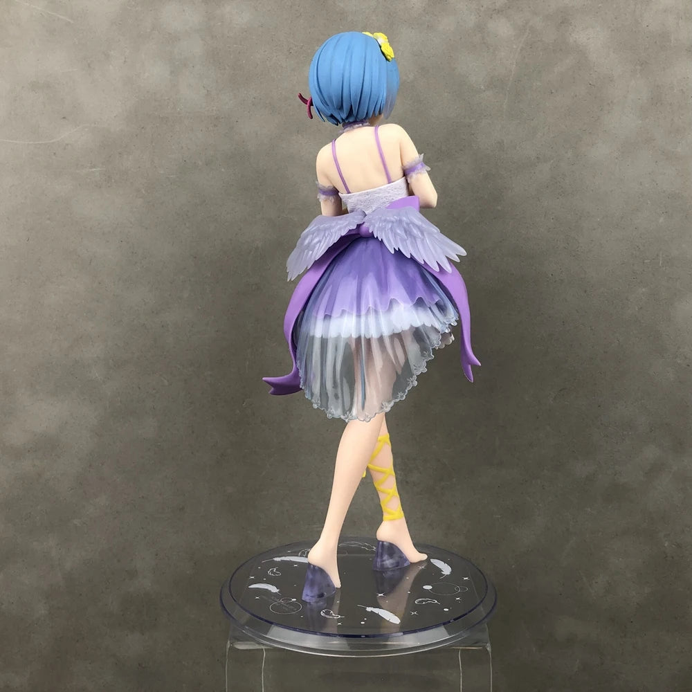 Collectible figure of a character in a purple dress with flowing details and blue hair, showcasing elegant design