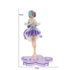 LuckeLadybug LLC collectible figure of a character in a blue dress with wings on a purple base