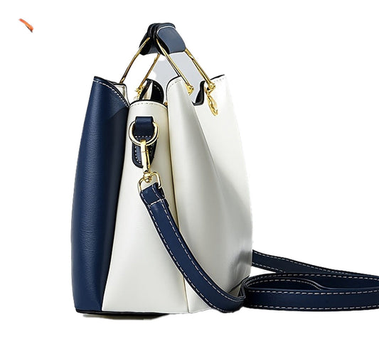 LuckeLadybug LLC colorblock top handle satchel in navy and white with stylish gold accents