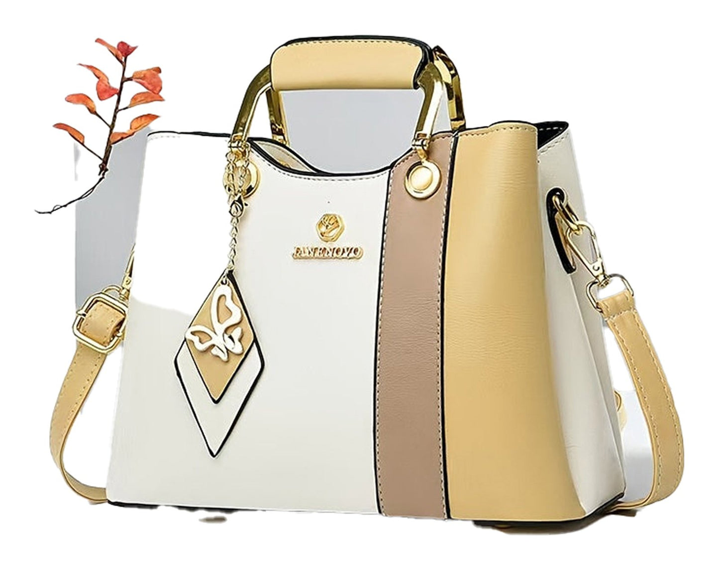 LuckeLadybug colorblock top handle satchel in white, tan, and yellow with a stylish charm and detachable strap
