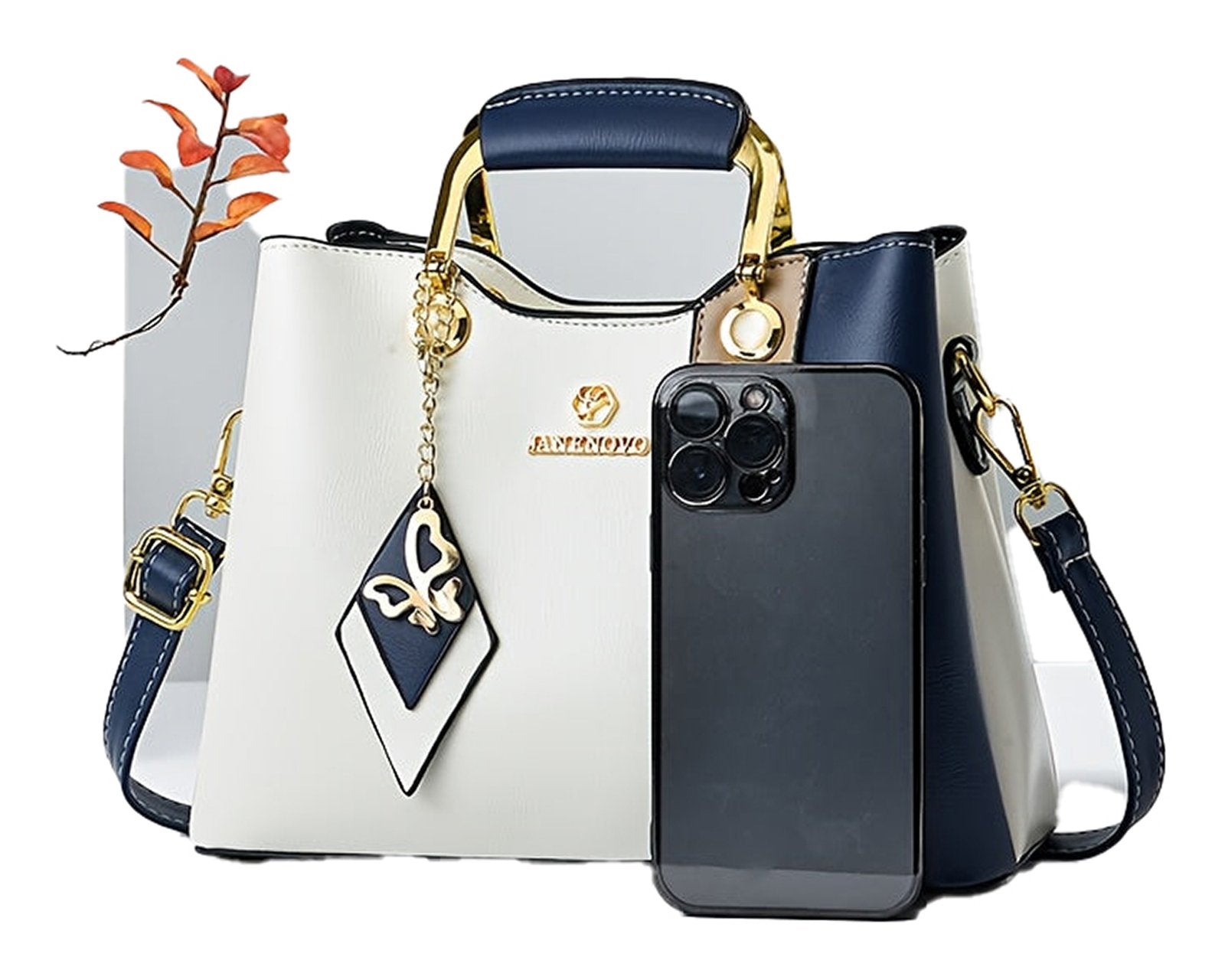 LuckeLadybug colorblock top handle satchel in cream and navy with gold accents and charm