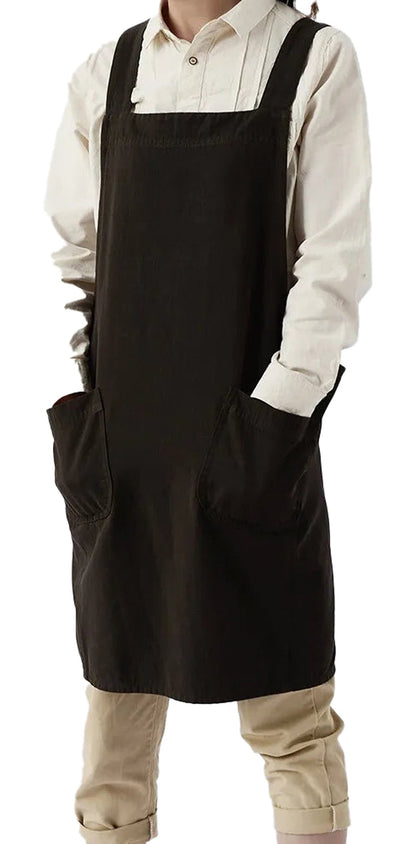 Cotton linen cross back apron in dark color with large front pockets for practical use