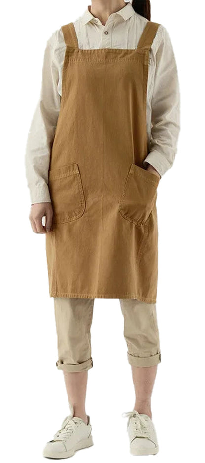 Cotton linen cross back apron in brown with pockets for kitchen or crafting use