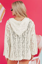 Cream crochet cover up for the beach with a hood, perfect for stylish summer outings