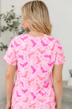 Pink LuckeLadybug LLC women's shorts featuring a cowboy western boots print for a fun casual look
