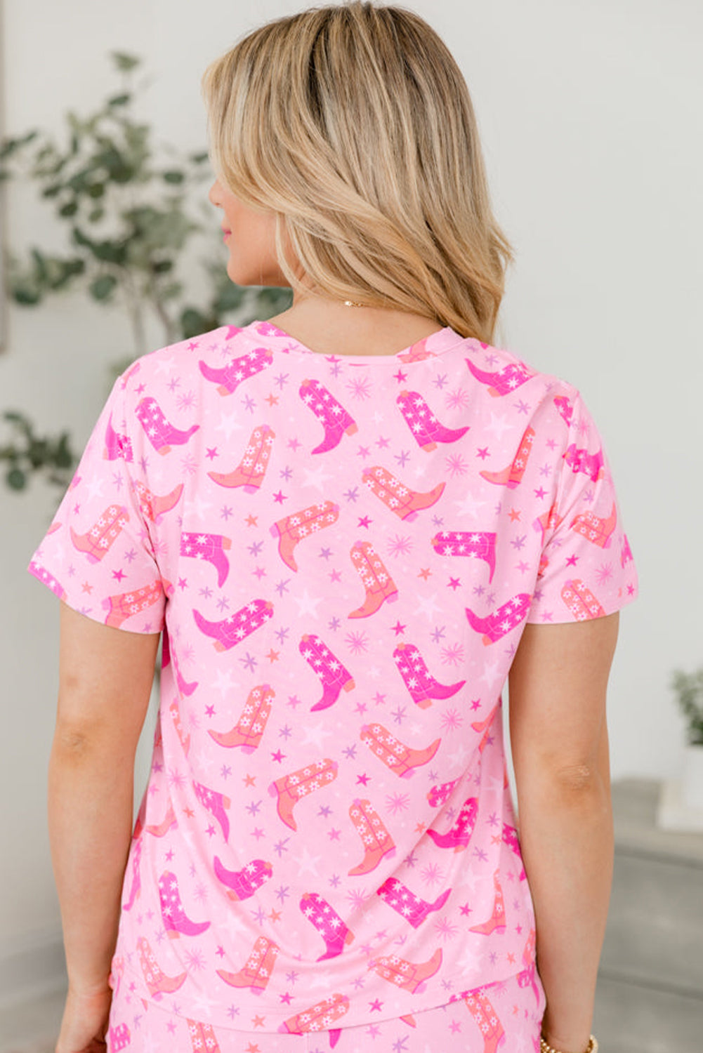 Pink LuckeLadybug LLC women's shorts featuring a cowboy western boots print for a fun casual look