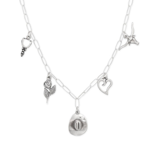 LuckeLadybug LLC cowgirl charm necklace featuring silver charms including a rose and a heart