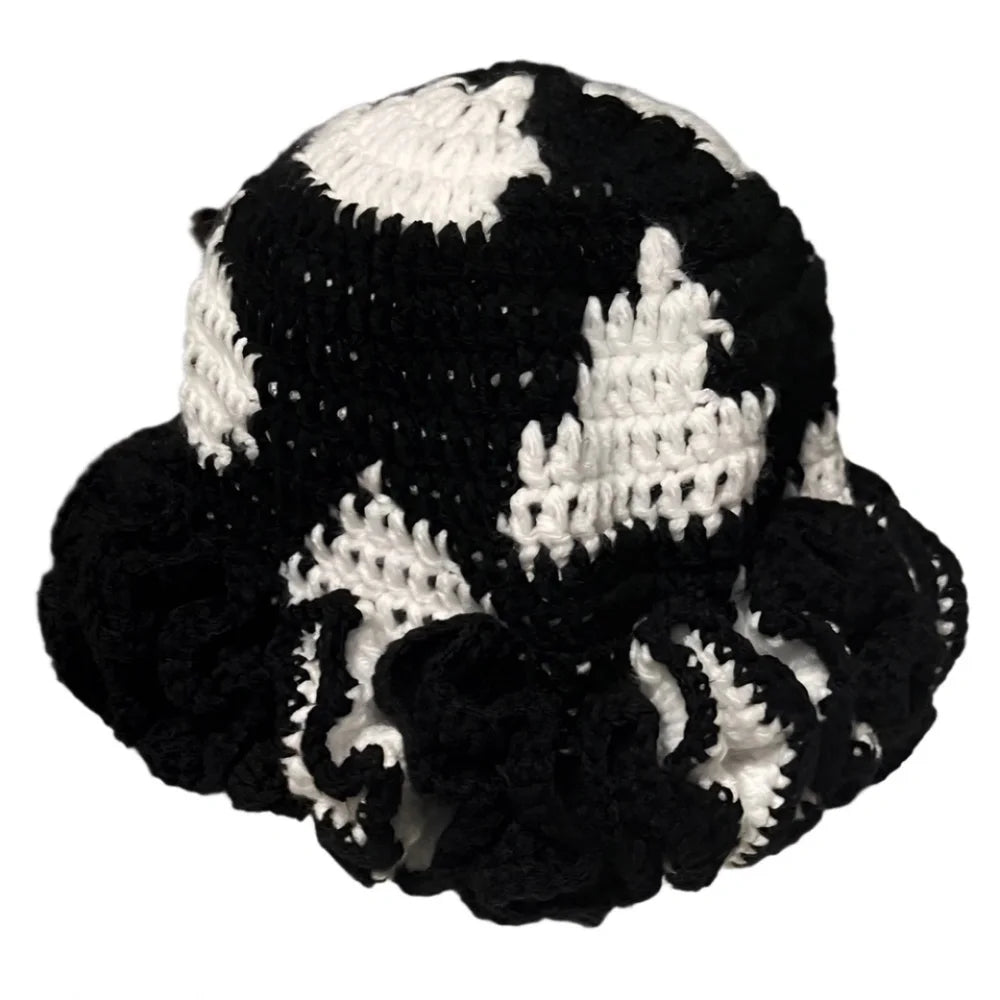 Handmade black and white crochet hat with ruffle, perfect for stylish accessories