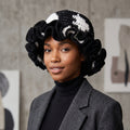 Stylish black and white crochet hat with ruffle for trendy fashion statements