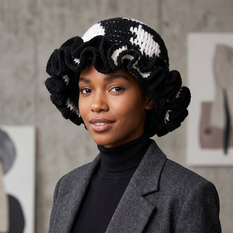 Stylish black and white crochet hat with ruffle for trendy fashion statements