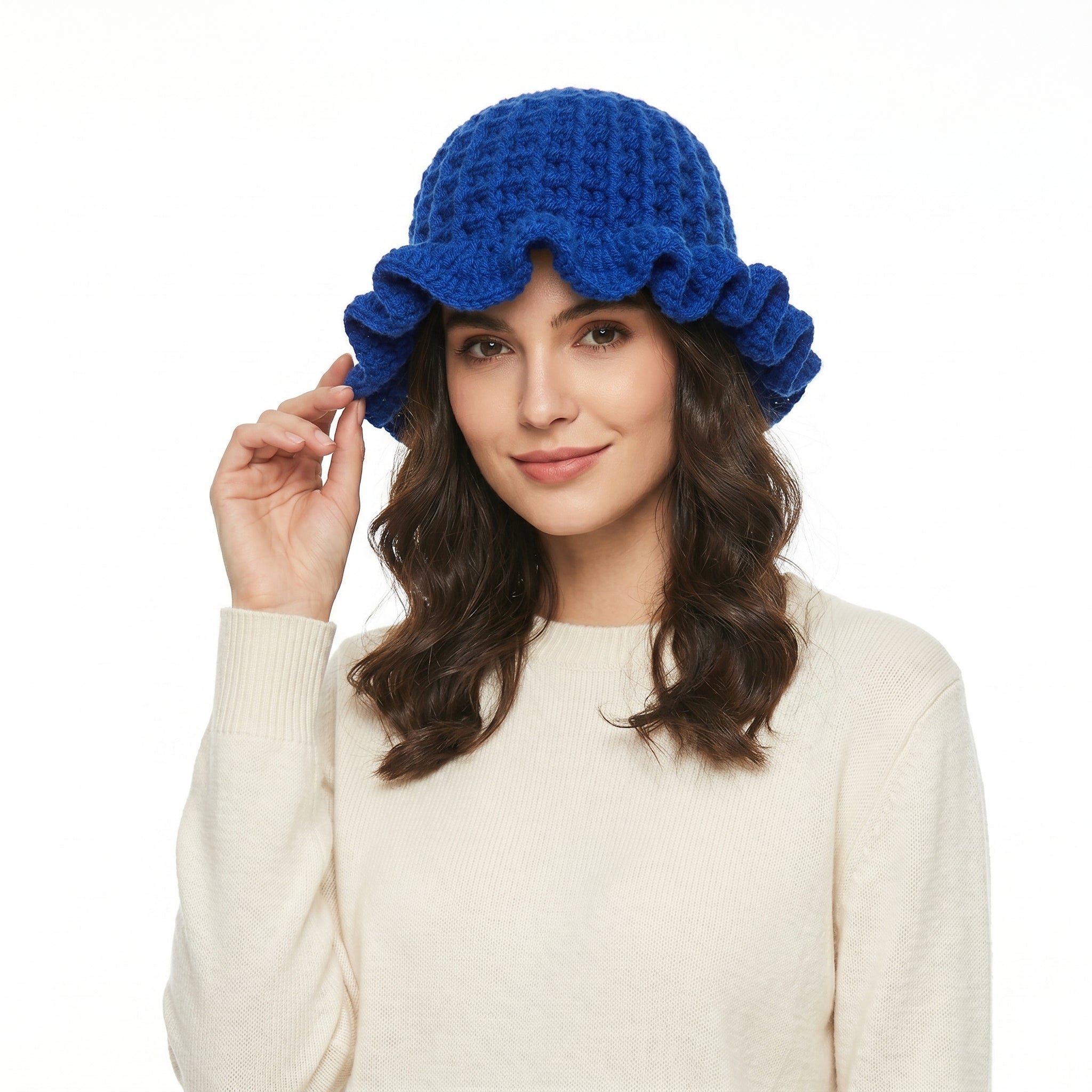 Crochet hat with ruffle in blue, featuring a stylish design and a comfortable fit